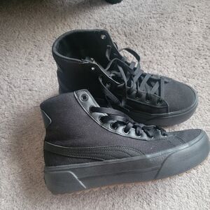 Women's Puma Kaia Black High-Top Sneakers with Canvas Upper. They run a bit wide